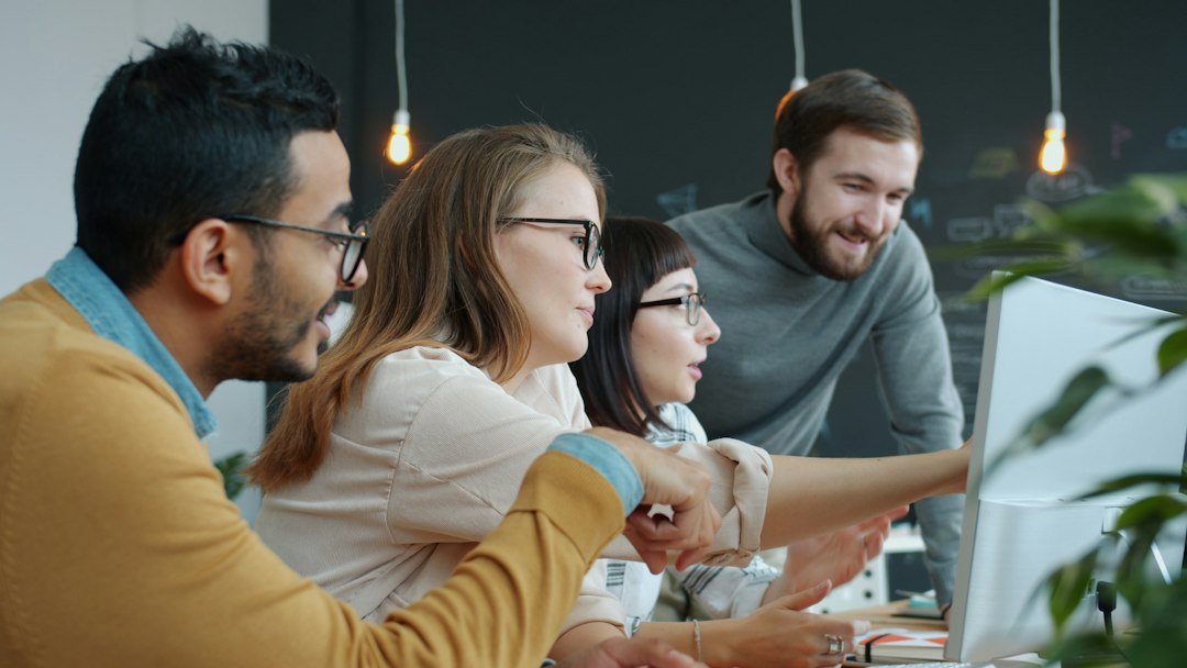 Marketing team reviewing a digital advertising campaign together